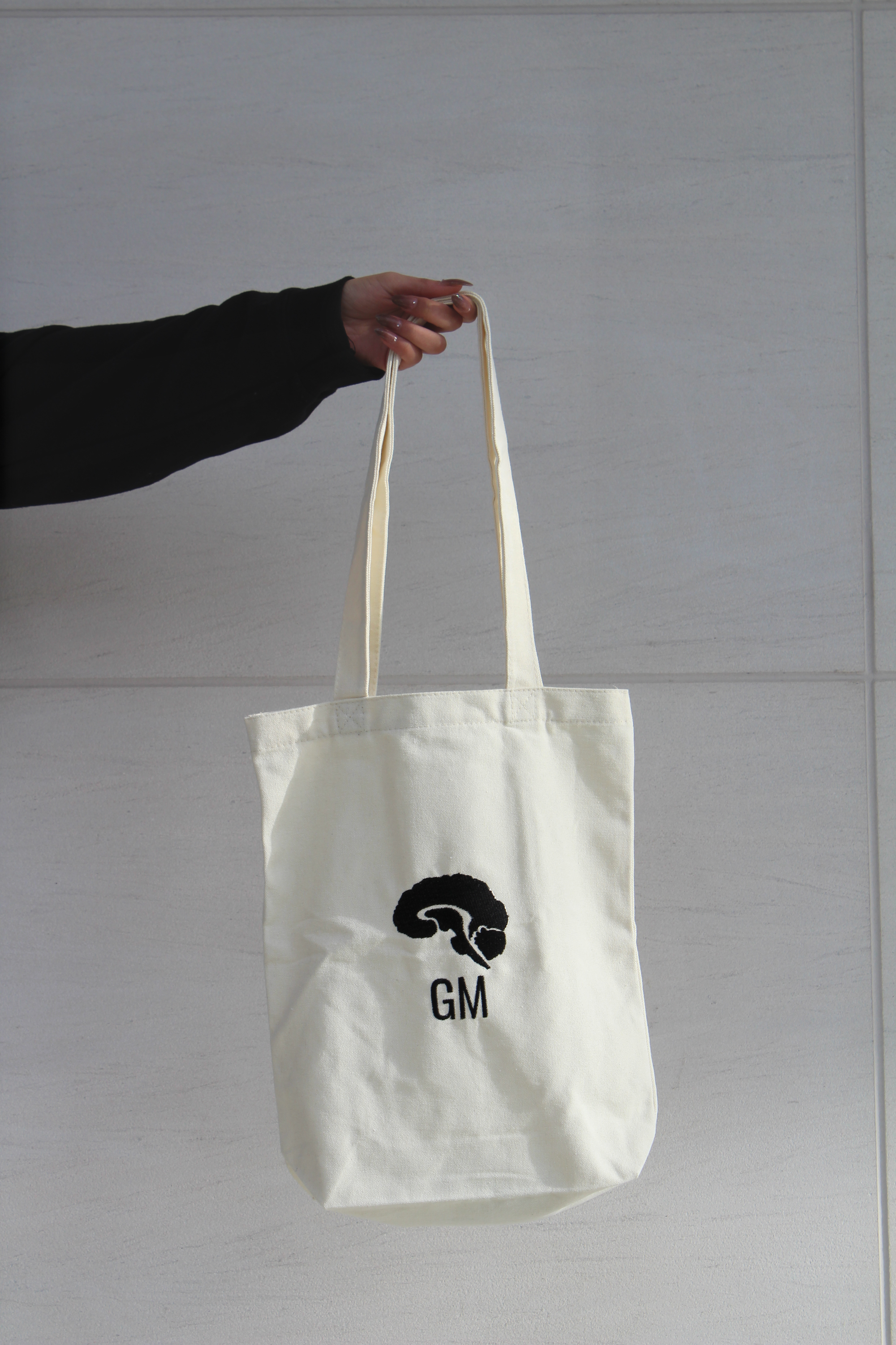 a Grey Matters tote bag