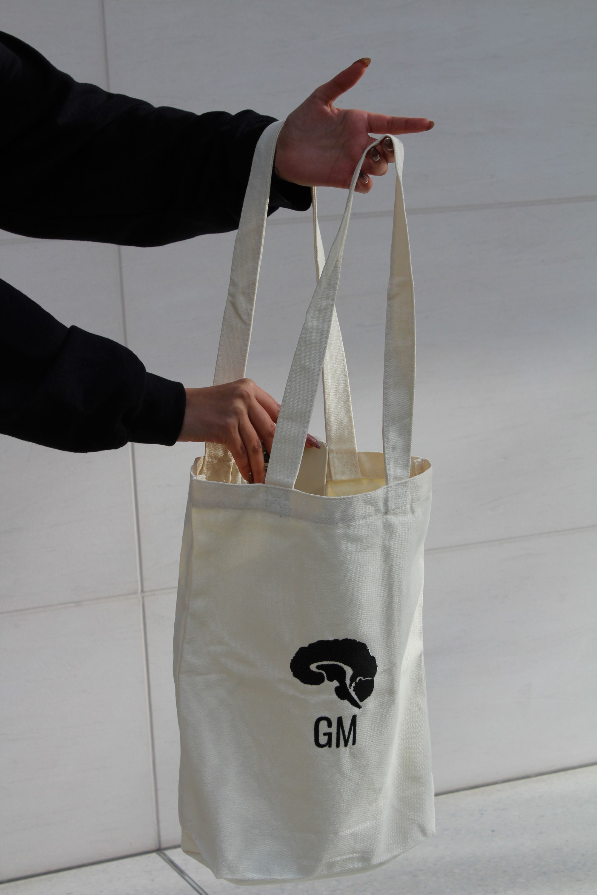 opening a Grey Matters tote bag